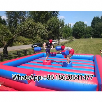 Outdoor Inflatable Combat Zone: Pillar - Based Dueling Fun with Padded Weapons